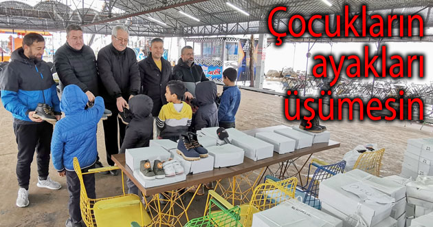 300 öğrenciye ayakkabı dağıttı