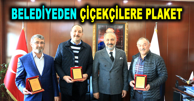 BELEDİYEDEN ÇİÇEKÇİLERE PLAKET