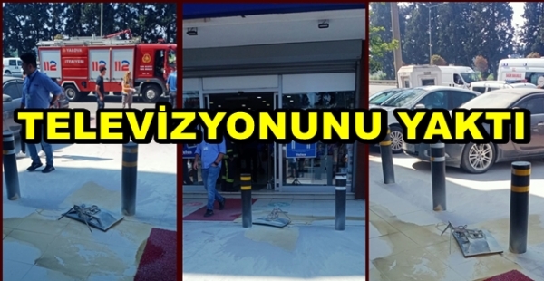 BOZUK TELEVİZYONUNU MAĞAZA ÖNÜNDE YAKTI