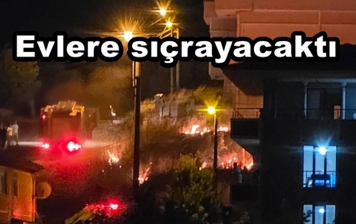 İSMETPAŞA MAHALLESİ'NDE YANGIN EVLERİ TEHDİT EDİYOR