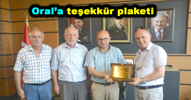 Oral’a teşekkür plaketi