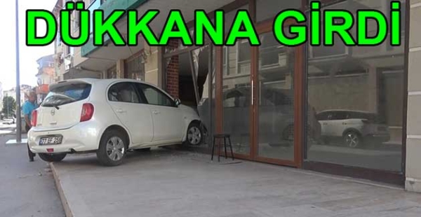 OTOMOBİLİYLE DÜKKANA GİRDİ