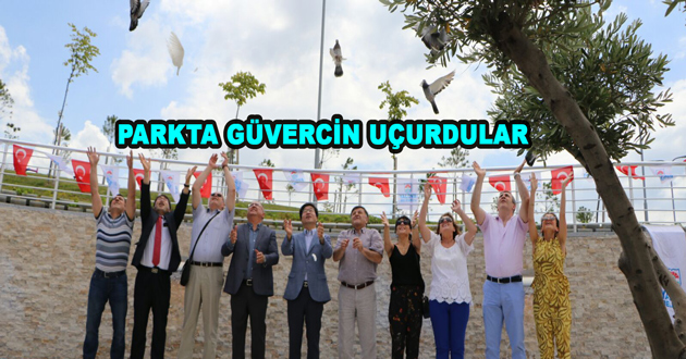 PARKTA GÜVERCİN UÇURDULAR