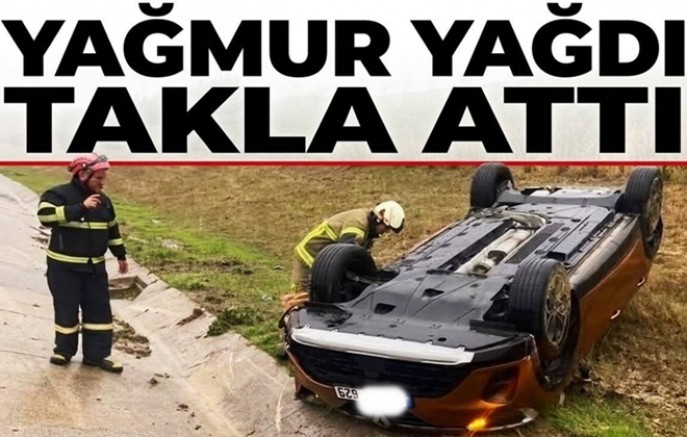 YAĞIŞTAN DOLAYI KAYGANLAŞAN YOLDA TERS DÖNDÜ